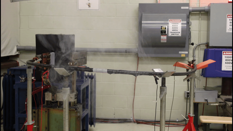A slow-motion view of a power cable subjected to a manufactured fault current (an abnormal electric current) engineered to test its response. 