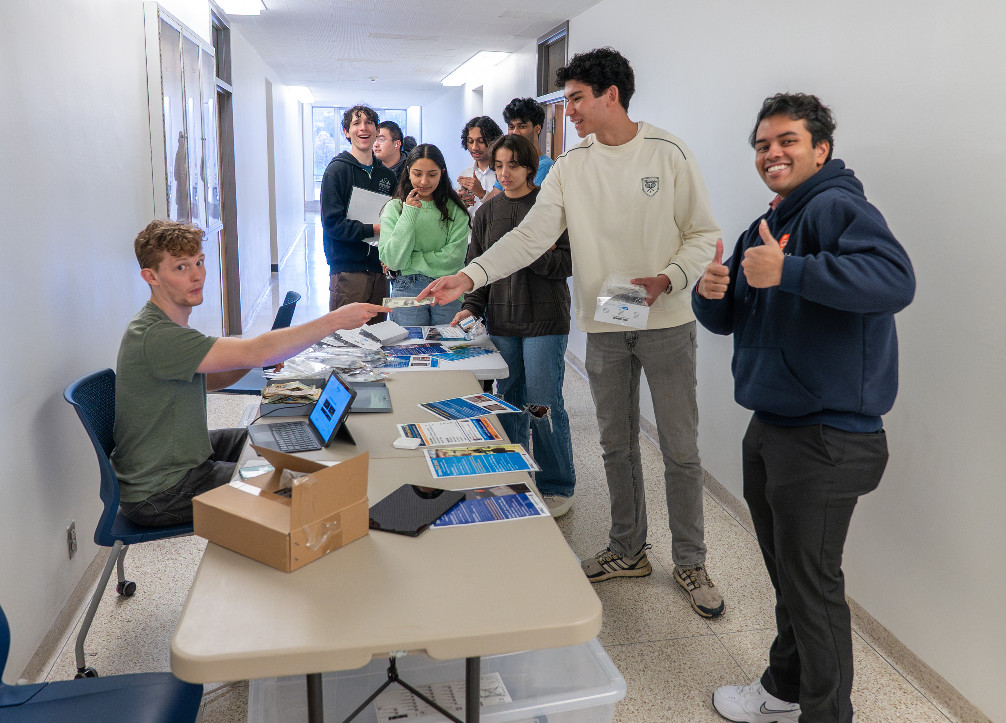 HKN members selling lab kits to students.