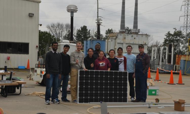 IEEE PES students working with the Haitian microgrid project