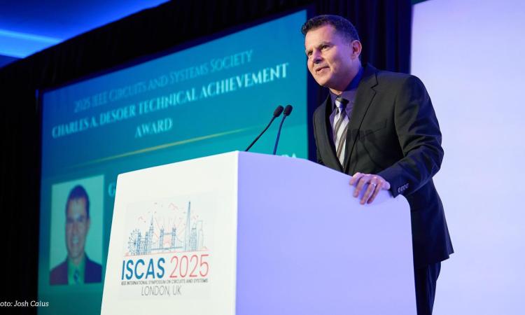 Rincón-Mora receiving the Charles A. Desoer Technical Achievement Award 