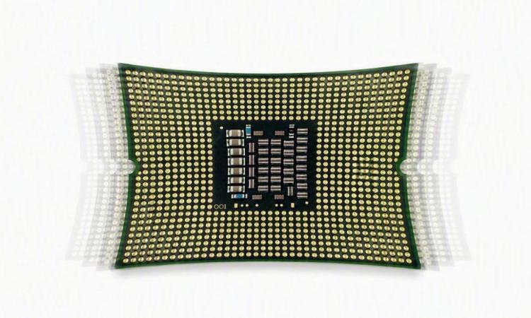 A photo of computer chip that looks like it's being pulled at the corners and vibrating.