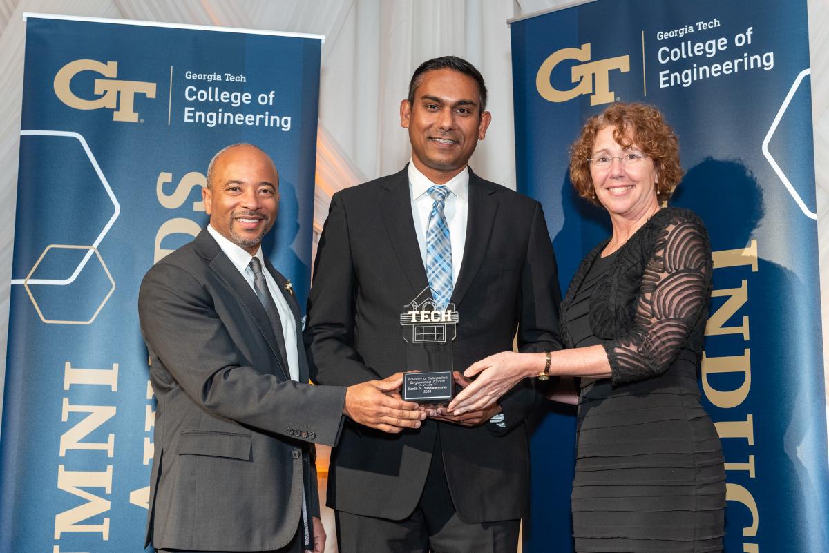 Kartik Sundareswaran (middle) receiving the Academy of Distinguished Engineering Alumni Award