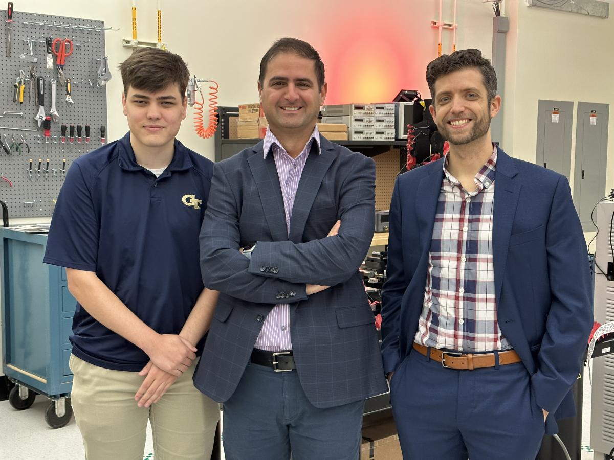 Graduate researcher Walter Disharoon, ECE Professor Nima Ghalichechian, and GTRI's Dr. Joshua Kovitz in Georgia Tech’s mmWave Antennas & Arrays Lab. 