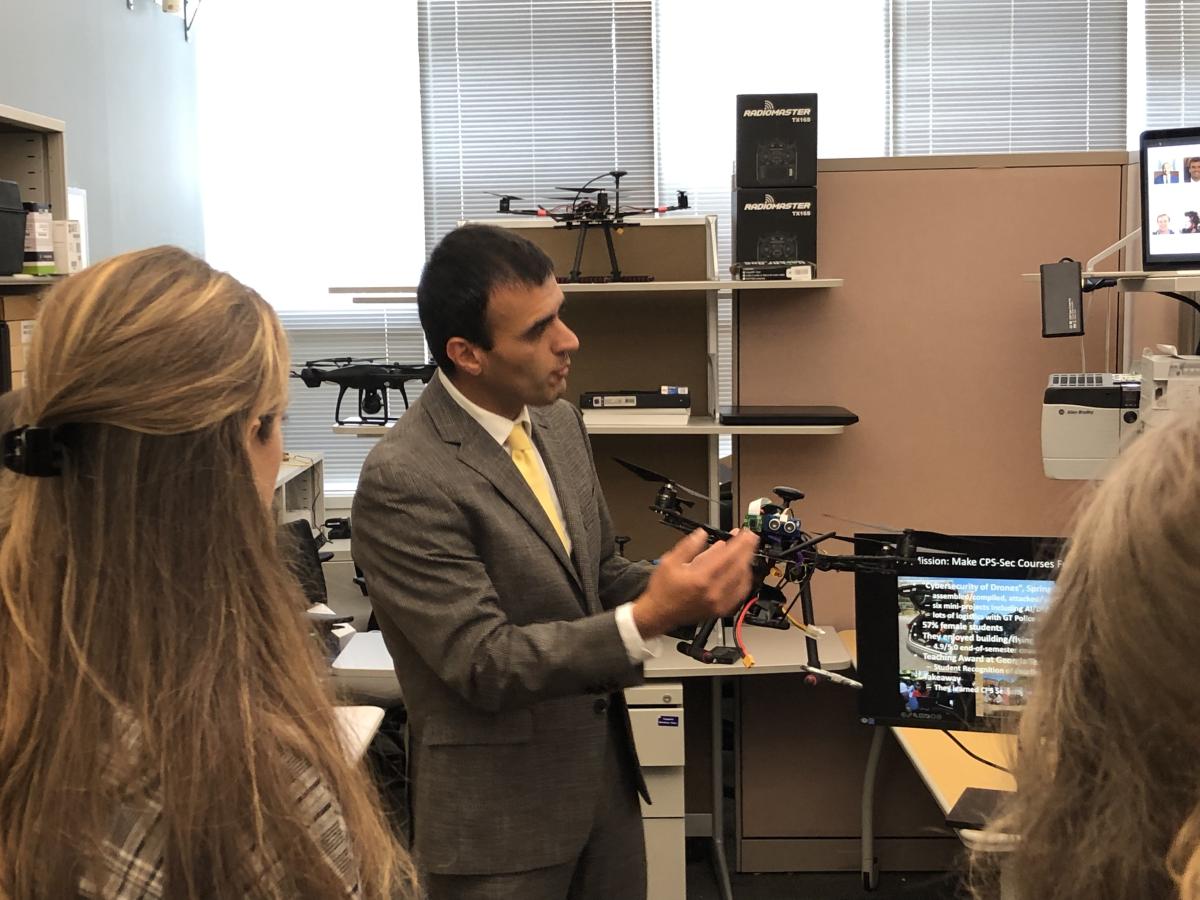 Congressional Staffers visit Georgia Tech's Communications Assurance and Performance Group (CAP) and the Cyber-Physical Systems Security Lab (CPSec). Zonouz demoing a drone.