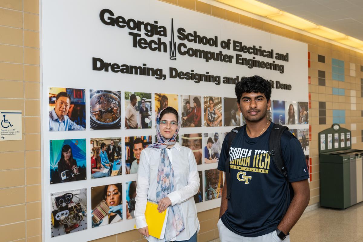 Undergraduate Students standing in the hallway