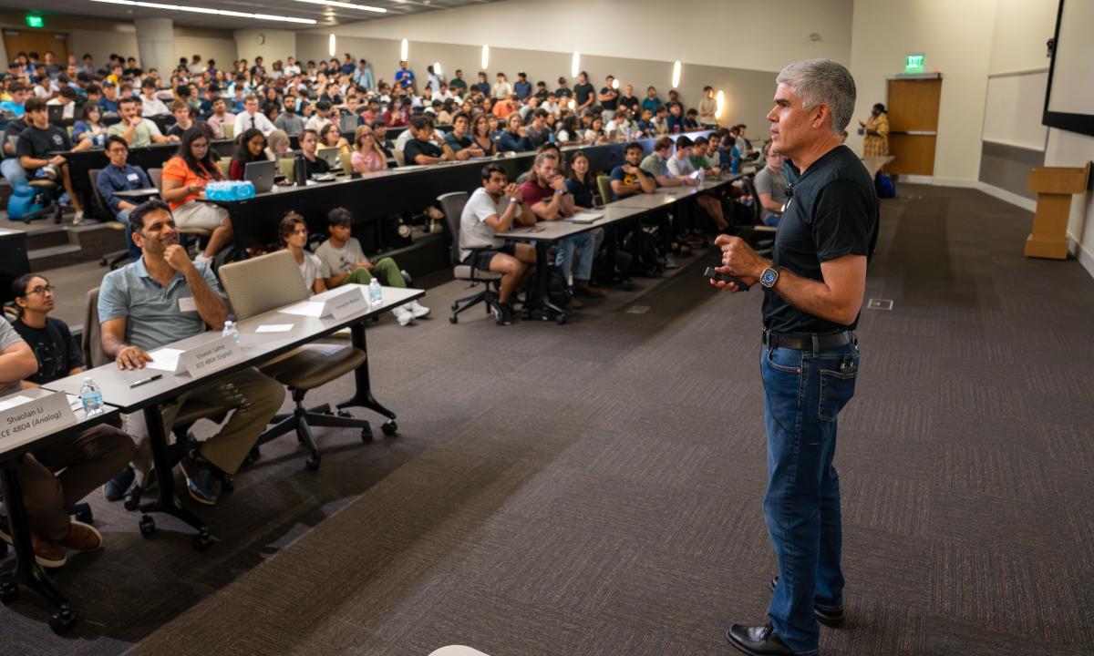 Apple engineering talking to students at kickoff event