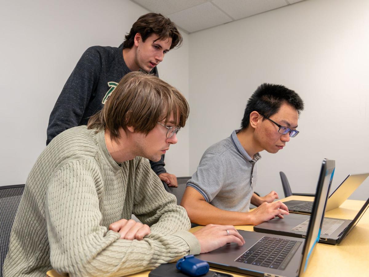 Silicon Jackets members in their breakout groups.