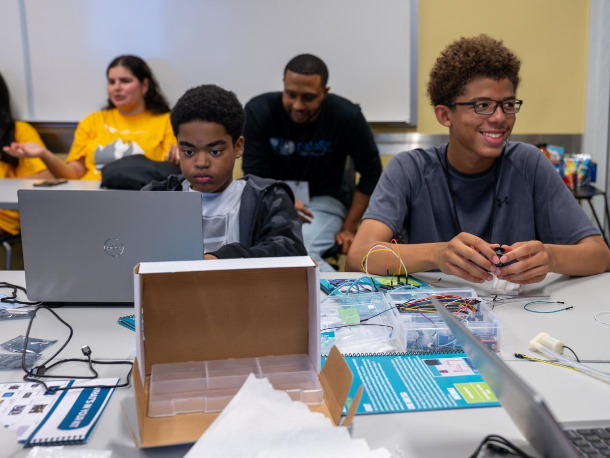 CoSense campers reviewing the code for their projects.