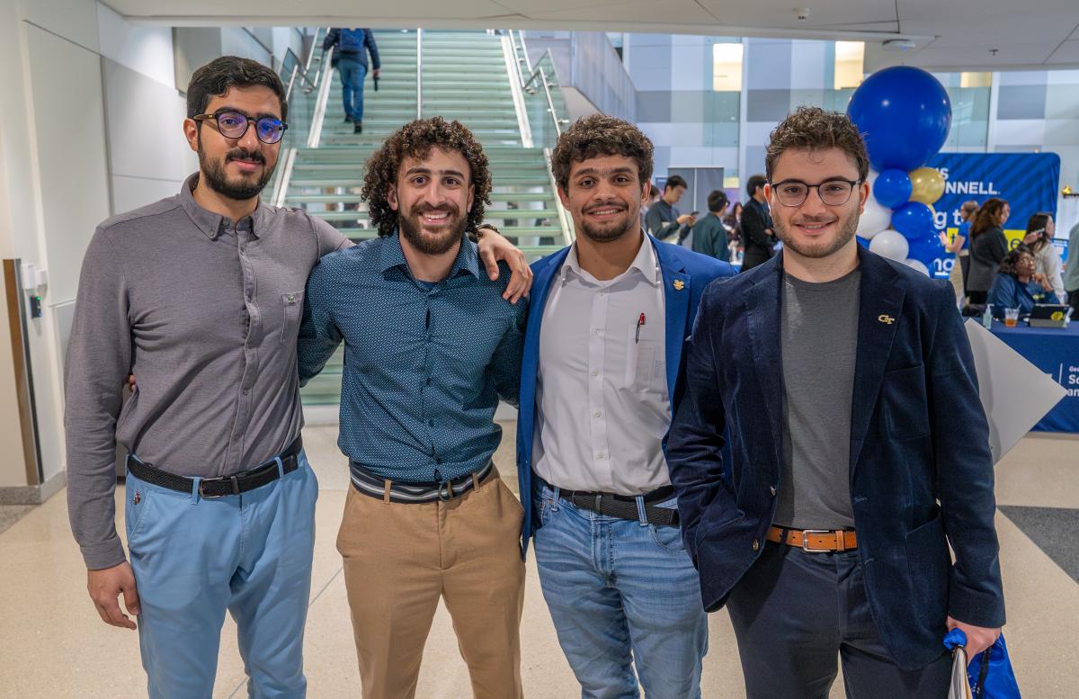 ECE Career Fair Homepage Banner- with four male students posing