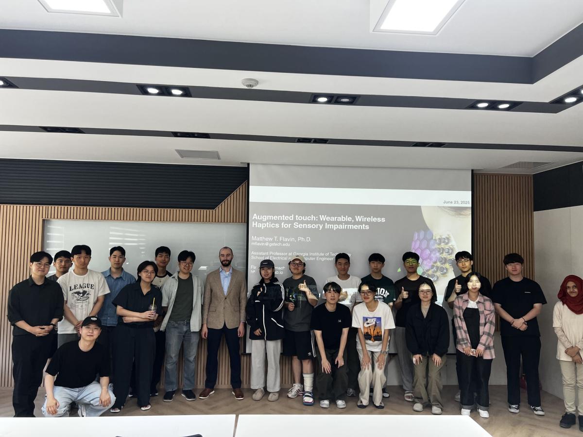 Matt Flavin presenting to student in Jeju Island