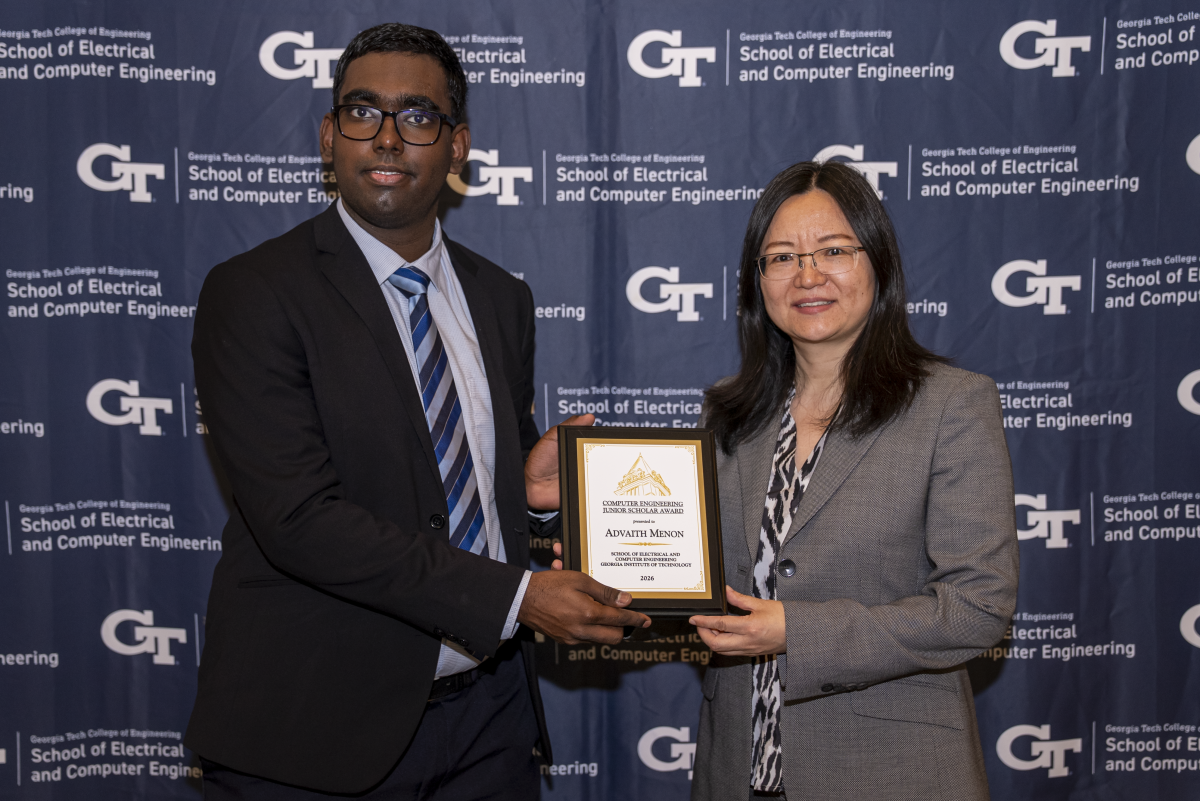 Advaith Menon with Senior Associate Chair Ying Zhang