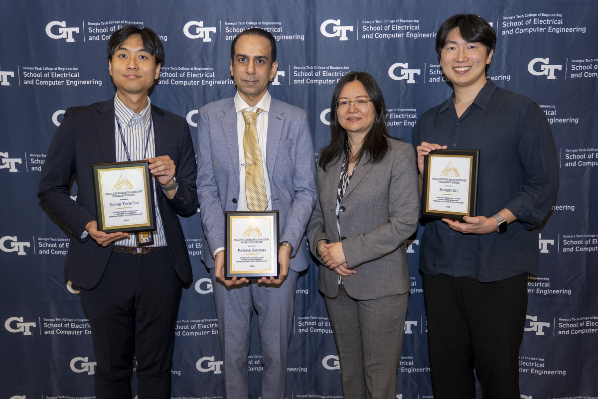 Seung Yoon Lee, Payman Behnam, and Seokjin Go with ECE Senior Associate Chair Ying Zhang
