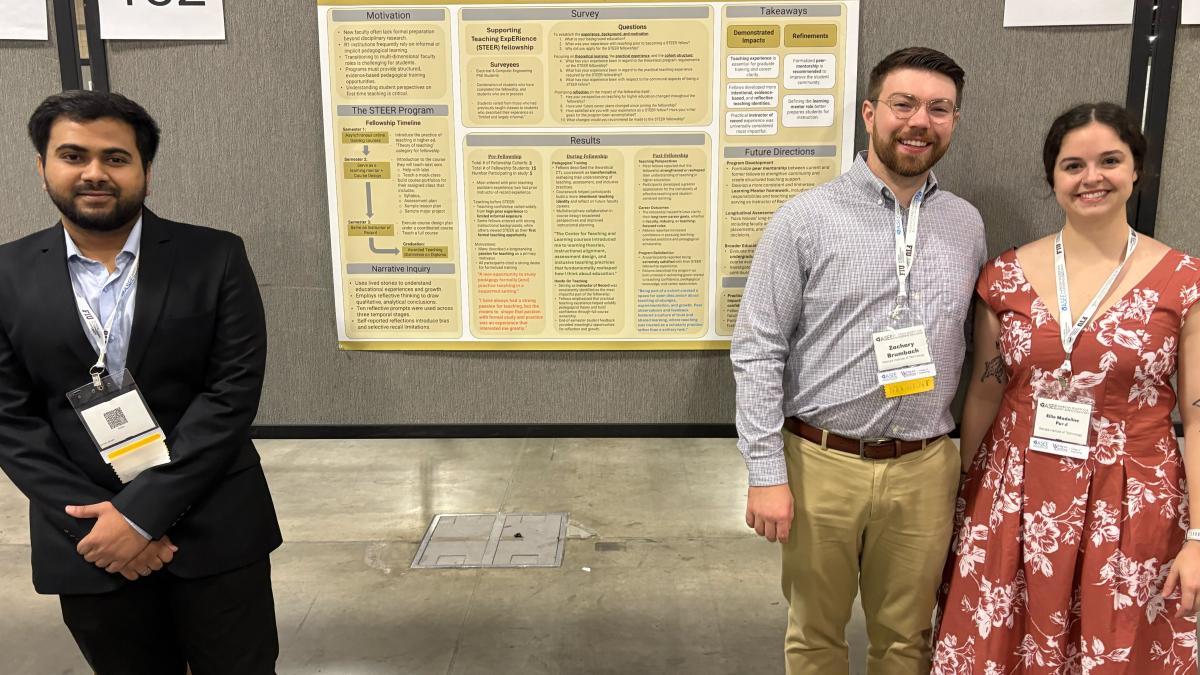  STEER Fellows Suman Ghosh, Zachary Brumbach, and Ellie Pond stand beside their poster presentation at the American Society for Engineering Education Annual Conference and Exposition. The project examined graduate students' experiences in ECE's Supporting Teaching ExpERience (STEER) Fellowship and its role in preparing future faculty members.   