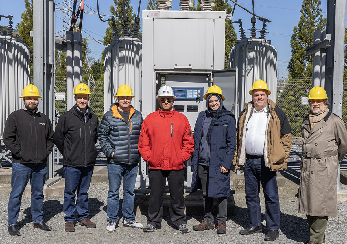 : The Georgia Tech research team is shown in the Marietta substation yard with collaborators from the city of Marietta. (Credit: City of Marietta)