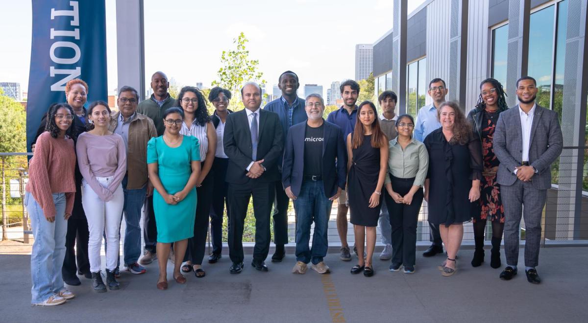 Photo of Micron CEO and President Sanjay Mehrotra and a team from Micron with Georgia Tech ECE representatives and students.