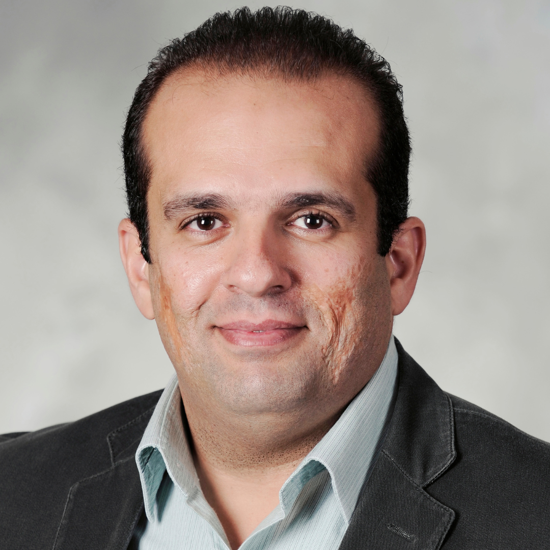 A picture of Ghassan smiling