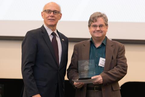 ECE Professor Aaron Lanterman (right) with Provost Rafael Bras