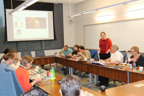 CRĀSI co-director Jennifer Curtis welcomes graduate students and researchers to a lunch/discussion meeting. (Photo by Renay San Miguel/Georgia Tech.)