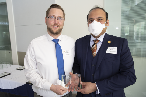 Chance Brown, Hats Off Performance Award, 2022 Roger P. Webb Awards Program. Pictured with Arijit Raychowdhury, Steve W. Chaddick School Chair.