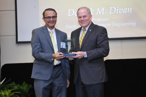 ECE Professor Deepak Divan (left) with Executive Vice President for Research Steve Cross 