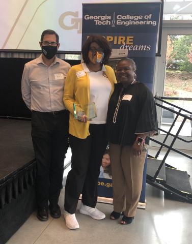 Raquel Plaskett (center) with Doug Blough and Kathy Kneeland