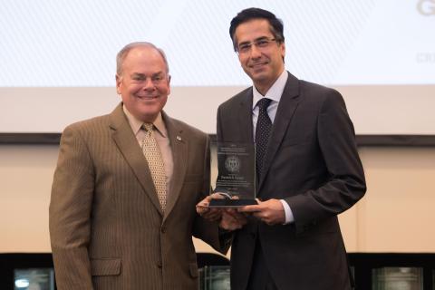 ECE Professor Farrokh Ayazi (right) with Executive Vice President for Research Steve Cross