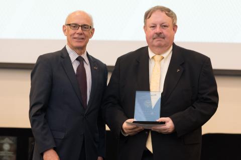 ECE Professor Joseph Hughes (right) with Provost Rafael Bras