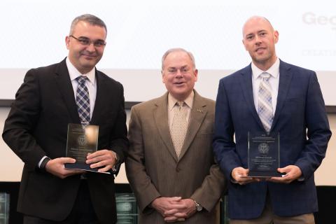 ECE Assistant Professor Manos Antonakakis and Chief Strategist GTRI CIPHER Laboratory Michael Farrell with Executive Vice President for Research Steve Cross