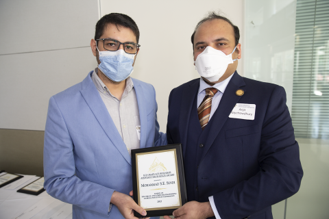 Mohammad S. E. Sendi, ECE Graduate Research Assistant Excellence Award, 2022 Roger P. Webb Awards Program. Pictured with Arijit Raychowdhury, Steve W. Chaddick School Chair.