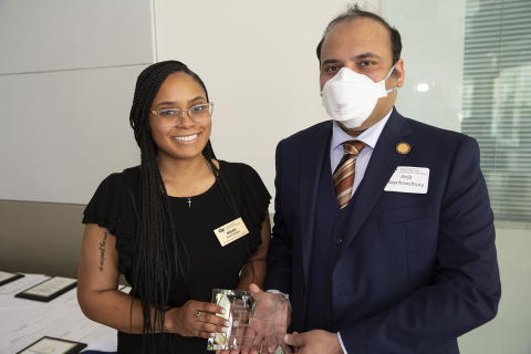 Nisaa Buchanan, Hats Off Performance Award, 2022 Roger P. Webb Awards Program. Pictured with Arijit Raychowdhury, Steve W. Chaddick School Chair.