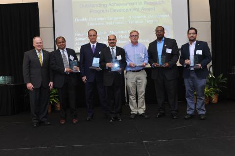 Executive Vice President for Research Steve Cross (left) with Outstanding Achievement in Research Program Development Award recipients: Professors Madhavan Swaminathan, Manos Tentzeris, Suresh Sitaraman, Peter Hesketh, Samuel Graham Jr., & Muhannad Bakir