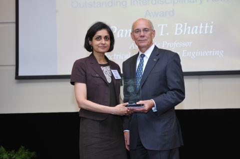 ECE Associate Professor Pamela Bhatti (left) with Provost Rafael Bras