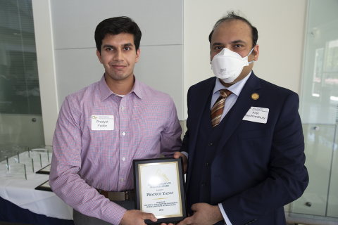 Pradyot Yadav, ECE Undergraduate Research Award, 2022 Roger P. Webb Awards Program. Pictured with Arijit Raychowdhury, Steve W. Chaddick School Chair.