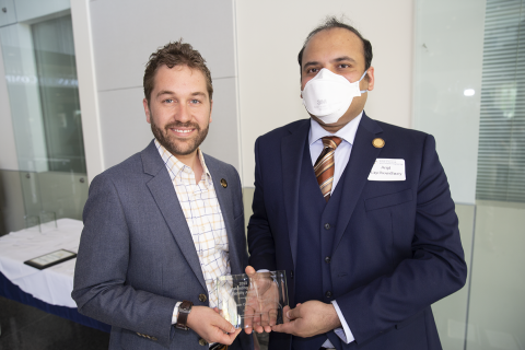 Sam Coogan, Outstanding Junior Faculty Member Award, 2022 Roger P. Webb Awards Program. Pictured with Arijit Raychowdhury, Steve W. Chaddick School Chair.