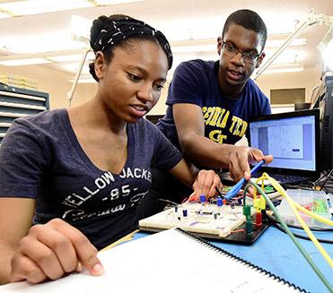 Industrial engineering major Bryanna Land and electrical engineering major Kinsey Blackmore are part of the Camp Twin Lakes team.