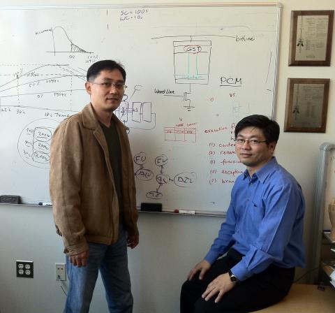 ECE Associate Professor Hsien-Hsin Sean Lee (r) is pictured with his Ph.D. student Nak Hee Seong.