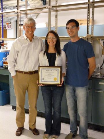 Emily Korby with Paul Kohl and Brennen Mueller in the lab Emily Korby with Paul Kohl and Brennen Mueller in the lab