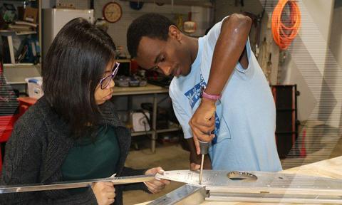 Biya Haile working in the lab