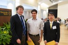 Adam Charles and Zhixuan Xia with CoE Associate Dean Larry Jacobs