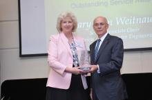 ECE Professor and Senior Associate Chair Mary Ann Weitnauer (left) with Provost Rafael Bras