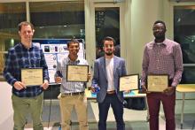 Team Aquarius members at the fall semester showcase for CREATE-X’s I2P program. Olatide Omojaro (right) is pictured with his teammates (L-R) Sam Youngdale, Daniel Albuquerque, and Elie Ghossain.