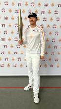 GTE/GT alumnus Louis Chen showing his Yellow Jacket pride with the Olympic torch.