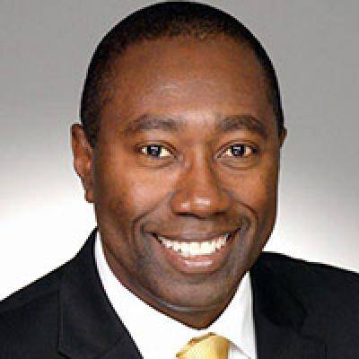 An image of Fred Anochie smiling