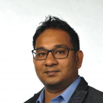 headshot of Asif