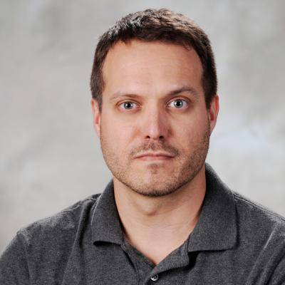 A picture of Jason Michael Clute smiling