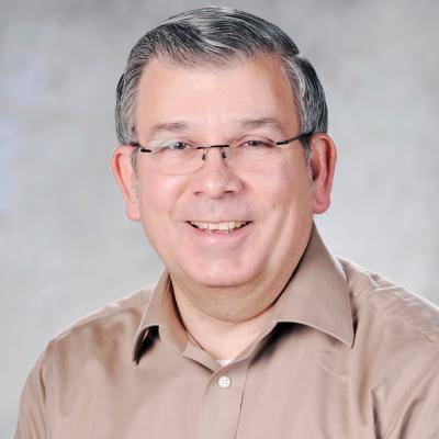 A picture of Thomas C III Champion smiling