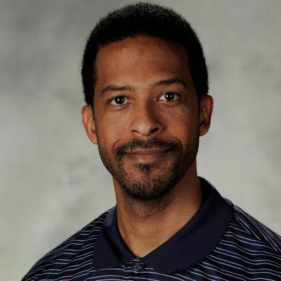 A picture of Brian C Rounsaville smiling