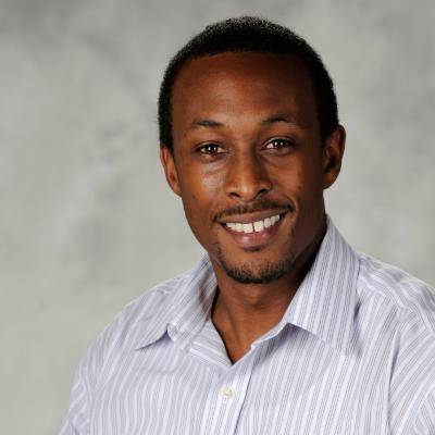 A picture of Christopher Malbrue smiling