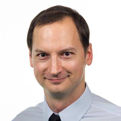 A picture of Gregory A. Krudysz smiling