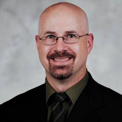 A picture of James B Steinberg smiling